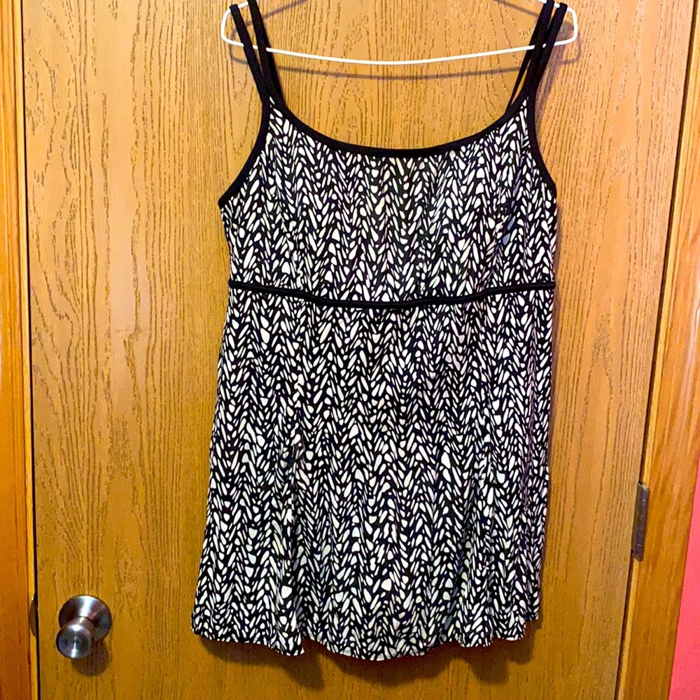 Fully lined one piece swim dress.